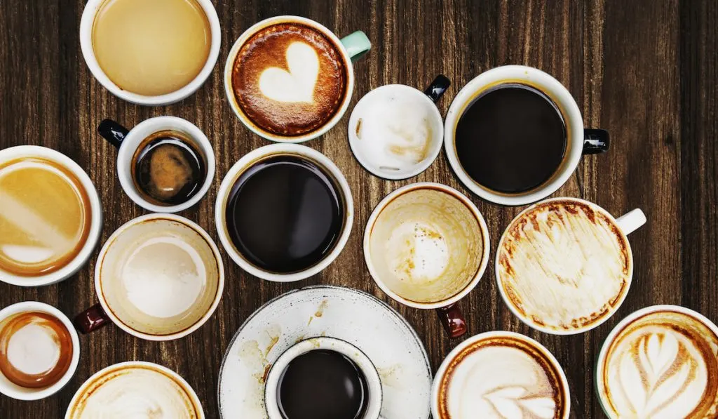 assorted coffee cups filled