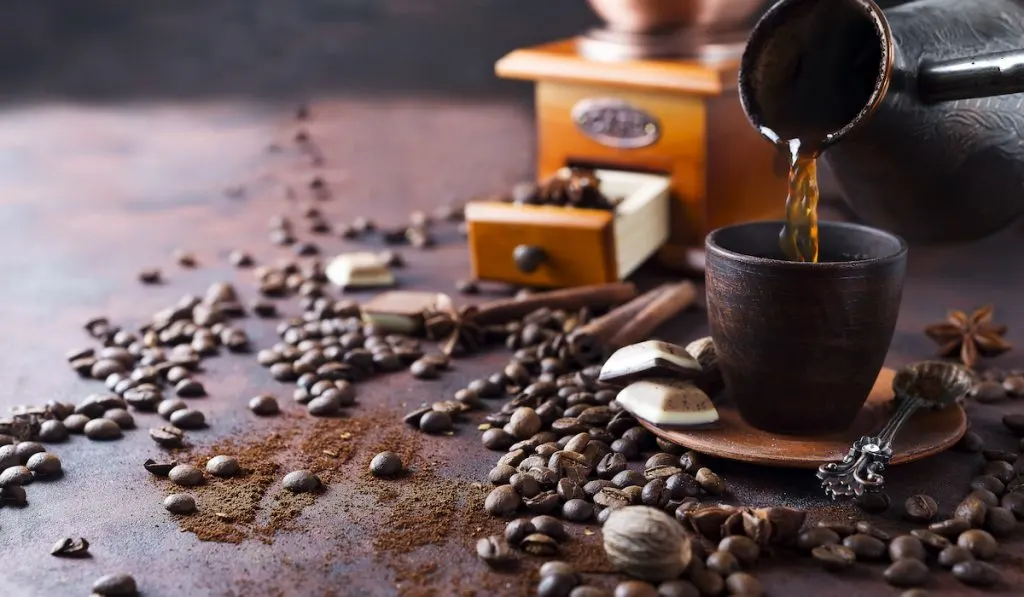 pouring coffee into cup