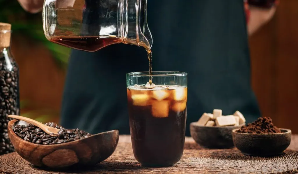pouring cold brew coffee