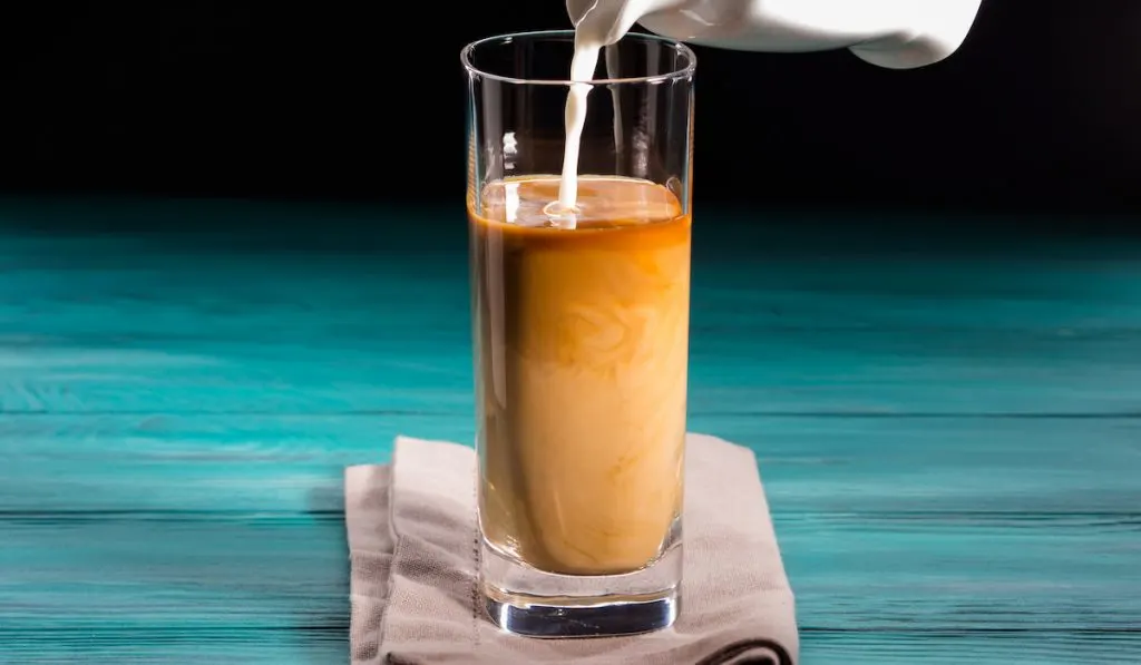 tall glass with iced coffee 