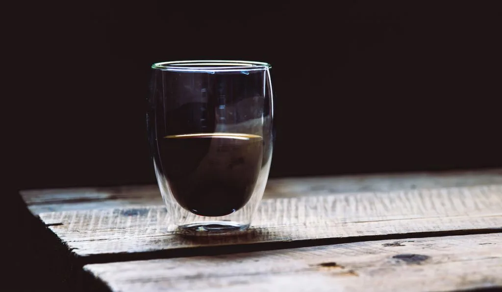 transparent cup of espresso