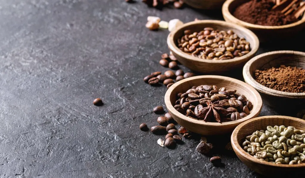 variety of coffee bean in a wooden saucer