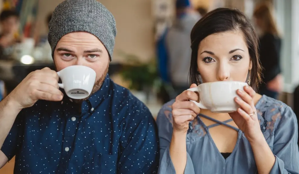 young couple drinking coffee together